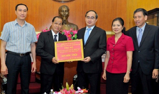 Lào ủng hộ Việt Nam 257.000 USD khắc phục hậu quả thiên tai
