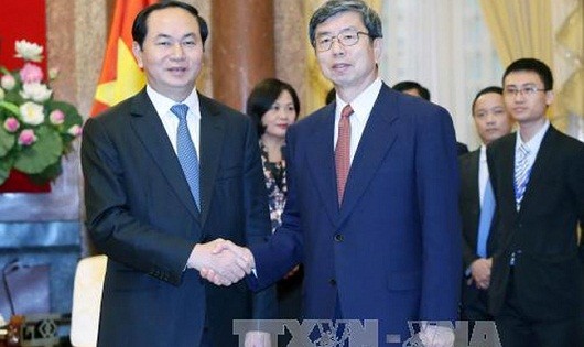 Chủ tịch nước Trần Đại Quang tiếp ngài Takehiko Nakao, Chủ tịch Ngân hàng phát triển châu Á (ADB). (Ảnh: TTXVN)