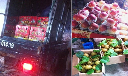 Hoa quả đựng trong thùng nhãn mác Trung Quốc nhưng được “khai sinh” nguồn gốc Việt Nam (ảnh do PV chụp tại chợ đầu mối Long Biên).