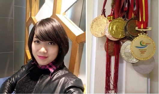 Nguyễn Huyền Trang cùng những huy chương mà cô đạt được.