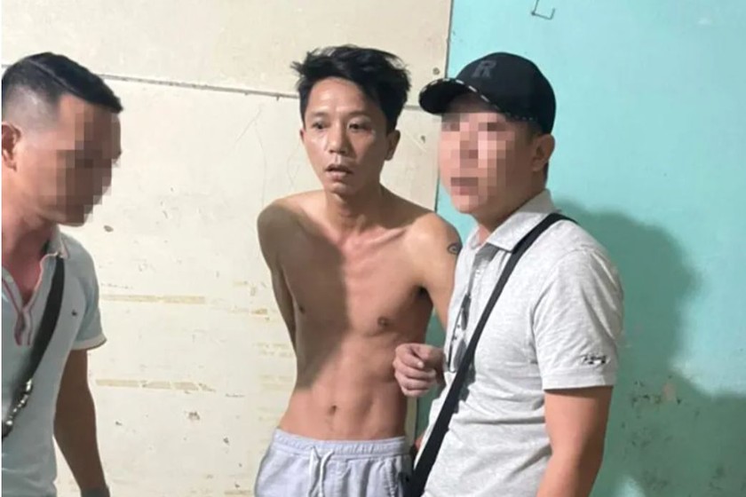 Lực lượng công an bắt giữ Sơn tại một phòng trọ ở Hà Nội. Ảnh: CACC