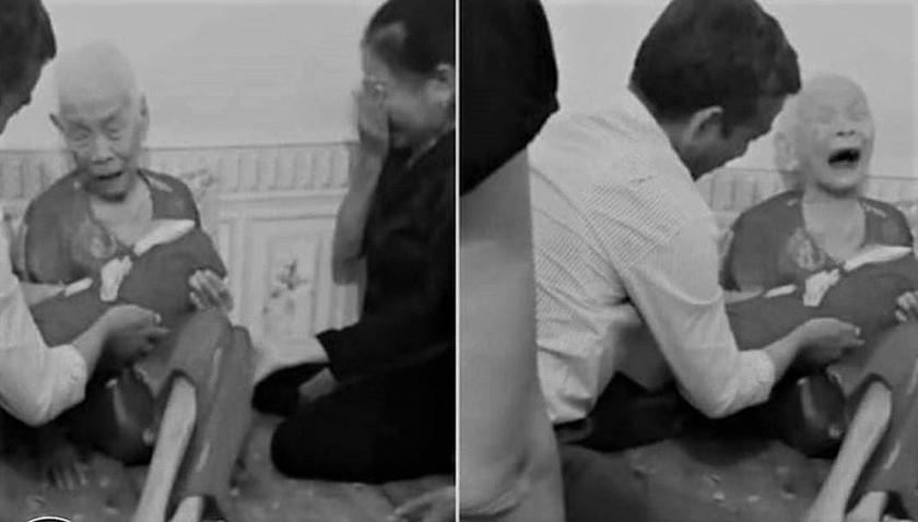 Mẹ Việt Nam anh hùng Nguyễn Thị Tân khóc khi ôm hài cốt con