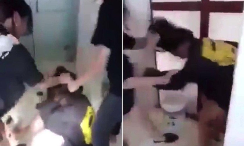 Hình ảnh nữ sinh bị đánh hội đồng - Ảnh cắt từ video clip