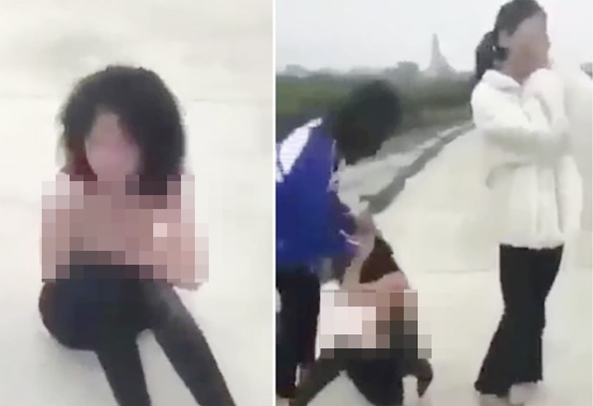 Hình ảnh nữ sinh bị nhóm bạn đánh (ảnh cắt từ video)