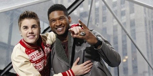 Justin Bieber (trái) và Usher - Ảnh: Reuters