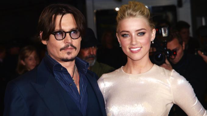 Amber Heard và Johnny Depp khi còn bên nhau. Ảnh: AFP