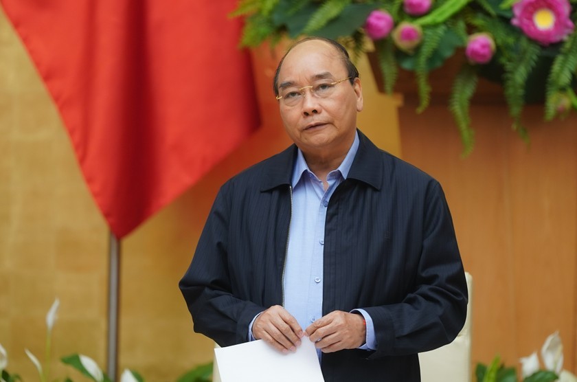 Thủ tướng Nguyễn Xuân Phúc chủ trì cuộc họp Thường trực Chính phủ để nghe Ban chỉ đạo quốc gia về phòng chống dịch bệnh COVID-19. Ảnh: VGP