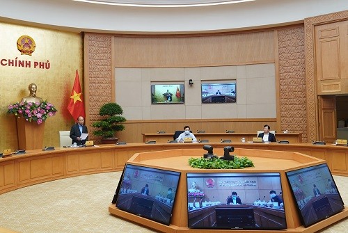 Thủ tướng Nguyễn Xuân Phúc chủ trì cuộc họp Thường trực Chính phủ nghe báo cáo của Ban Chỉ đạo quốc gia về phòng chống dịch COVID-19. Ảnh: VGP