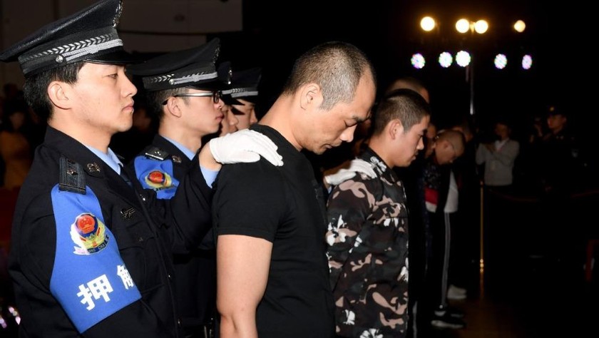 Các bị cáo liên quan đến băng nhóm tại Tây An (tỉnh Thiểm Tây) bị xét xử. Ảnh: ChinaDaily