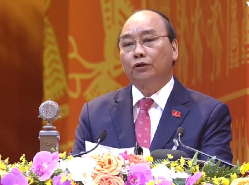 Thủ tướng Chính phủ Nguyễn Xuân Phúc thay mặt Đoàn chủ tịch Đại hội XIII trình bày Diễn văn khai mạc Đại hội XIII của Đảng.