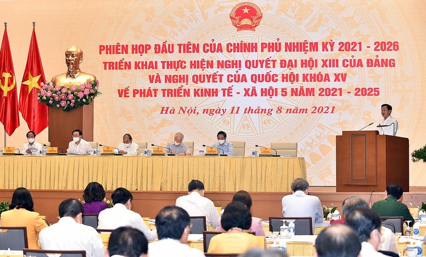 Phó Thủ tướng Chính phủ Lê Minh Khái đã trình bày Báo cáo tại Phiên họp trực tuyến toàn quốc của Chính phủ với các địa phương sáng 11/8. Ảnh: VGP/Nhật Bắc