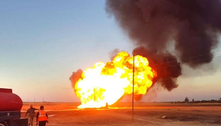 Đám cháy sau vụ nổ một đường ống dẫn khí đốt tại nhà máy điện Deir Ali. Ảnh: AP