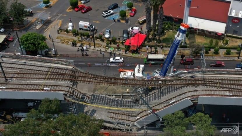 Ảnh chụp từ trên cao cho thấy địa điểm trong đó một phần của đường ray trên cao bị sập, khiến một đoàn tàu lao xuống vào ngày 3/5/2021 ở Thành phố Mexico. Ảnh: AFP (chụp ngày 10/5/2021) 