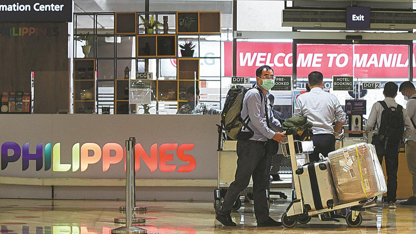 Sân bay Quốc tế Ninoy Aquino ở Manila hôm 10/2, ngày lệnh cấm du khách nước ngoài được dỡ bỏ. Ảnh: Reuters