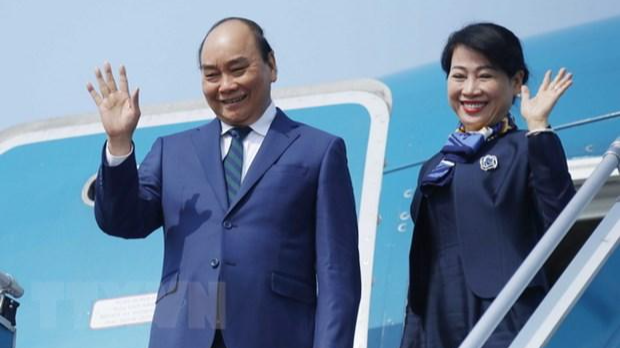 Chủ tịch nước Nguyễn Xuân Phúc và Phu nhân lên đường thăm cấp Nhà nước tới Cộng hòa Singapore. Ảnh: Thống Nhất/TTXVN