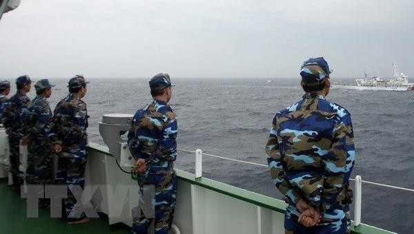 ​Cảnh sát biển Việt Nam trong chuyến tuần tra chung kiểm tra liên hợp nghề cá Vịnh Bắc Bộ Việt Nam-Trung Quốc. Ảnh: Tuấn Anh/TTXVN.