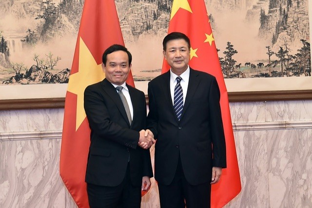 Phó Thủ tướng Trần Lưu Quang và Chủ tịch Ủy ban Quốc gia về phòng, chống ma túy, Bộ trưởng Bộ Công an Trung Quốc Vương Tiểu Hồng - Ảnh: VGP/Hải Minh