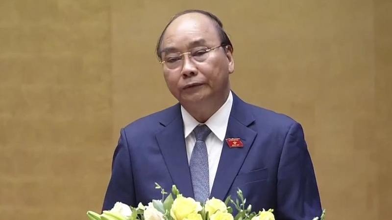 Thủ tướng Nguyễn Xuân Phúc báo cáo tại Kỳ họp thứ 9.