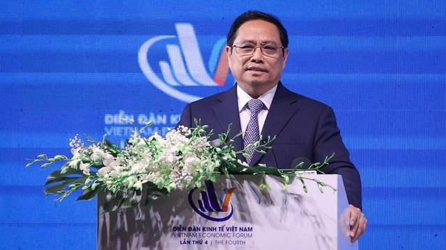 Thủ tướng Phạm Minh Chính phát biểu tại Diễn đàn Kinh tế Việt Nam lần thứ 4.