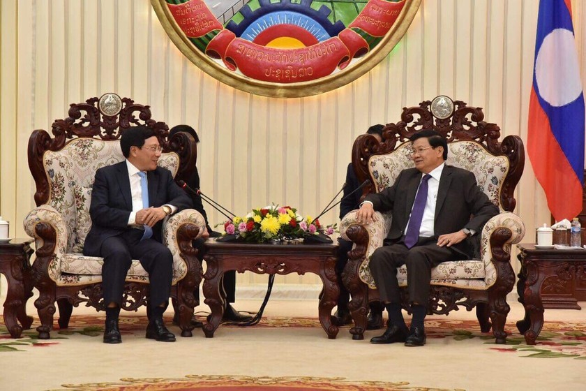 Phó Thủ tướng, Bộ trưởng Ngoại giao Phạm Bình Minh đến chào Thủ tướng Lào Thongloun Sisoulith.
