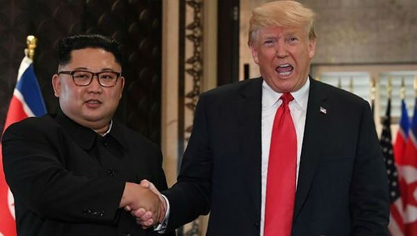 Ông Trump và ông Kim tại cuộc gặp lịch sử ở Singapore.