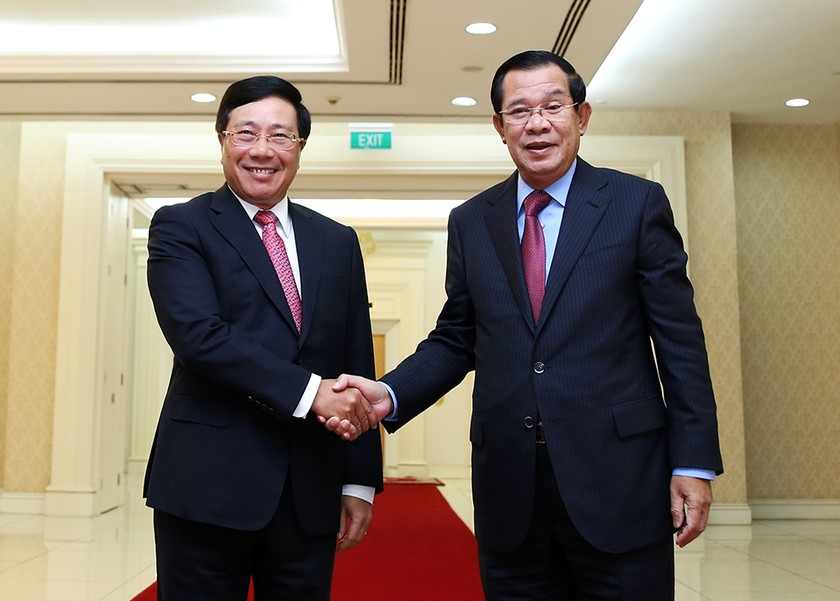 Phó Thủ tướng, Bộ trưởng Ngoại giao Phạm Bình Minh gặp Thủ tướng Campuchia Hun Sen. Ảnh: BNG