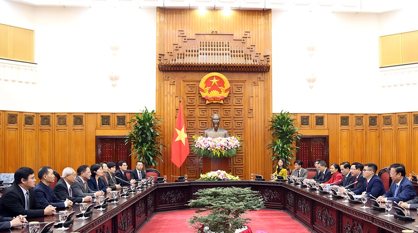 Phó Thủ tướng Phạm Bình Minh tiếp Phó Hội trưởng Hội Ngoại giao công chúng Trung Quốc Hồ Chính Dược. Ảnh: VGP
