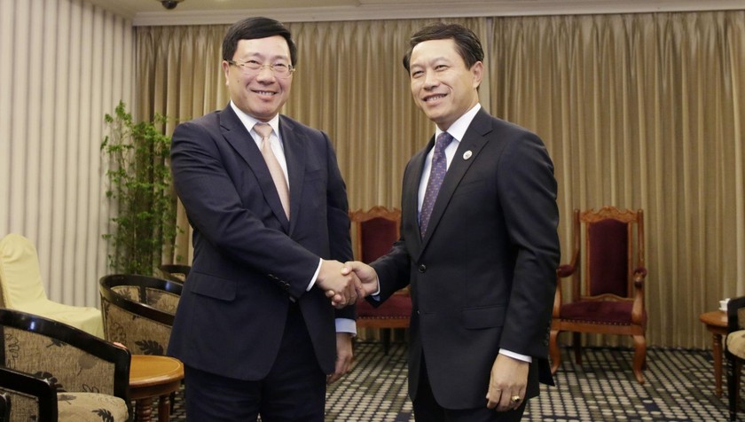 Phó Thủ tướng, Bộ trưởng Phạm Bình Minh và Bộ trưởng Ngoại giao Lào Saleumxay Kommasith.