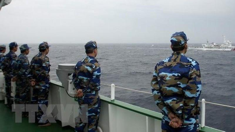 ​Cảnh sát biển Việt Nam trong chuyến tuần tra chung kiểm tra liên hợp nghề cá Vịnh Bắc Bộ Việt Nam-Trung Quốc. Ảnh: TTXVN.