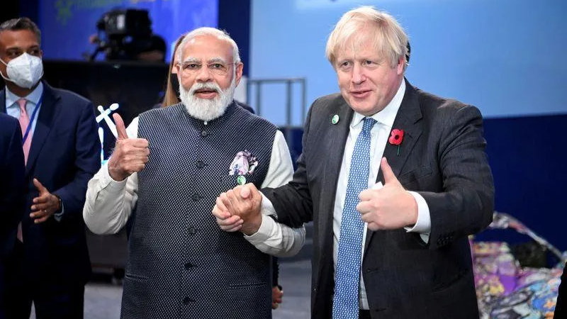 Thủ tướng Ấn Độ Modi và người đồng cấp Anh Johnson tại Hội nghị COP26 được tổ chức ở Glasgow, Anh hồi tháng 11 năm ngoái.