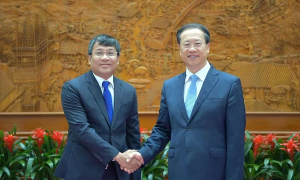 Thứ trưởng Thường trực Nguyễn Minh Vũ và Thứ trưởng Thường trực Bộ Ngoại giao Trung Quốc Mã Triều Húc.