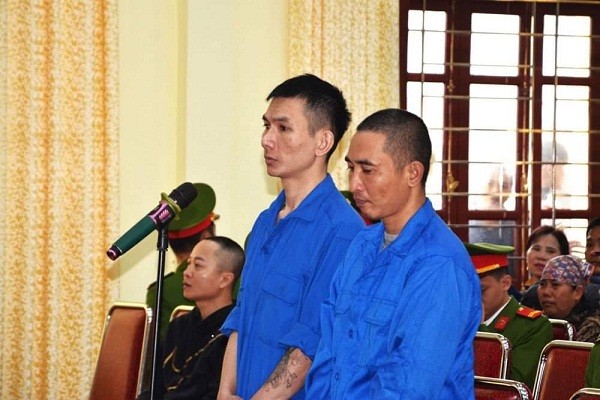  Hai bị cáo Lương Văn Đạt và Nguyễn Văn Doanh.