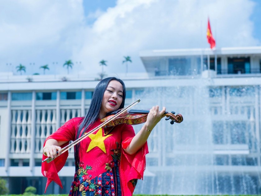 Tác phẩm "Đất nước trọn niềm vui" được Trịnh Minh Hiền chuyển soạn cho cây đàn violon và trực tiếp trình diễn, dàn dựng (ảnh BTC).