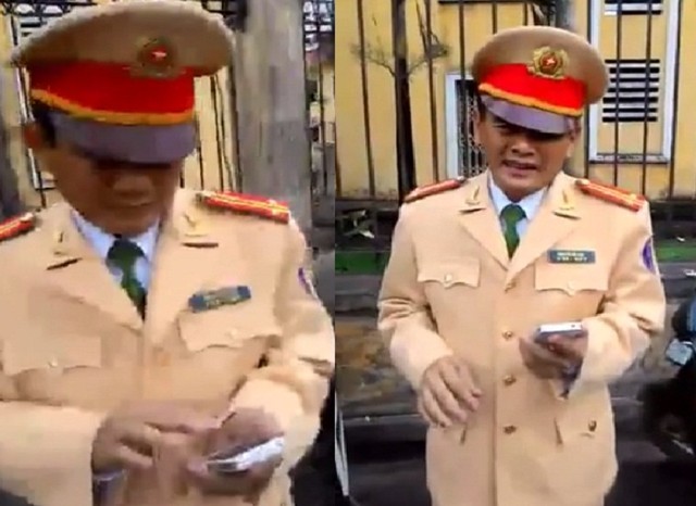 Trung tá Nguyễn Bá Hòa - Phó Đội trưởng Đội CSGT Công an quận Lê Chân khi tiếp xúc với thanh niên vi phạm (Ảnh cắt từ clip).